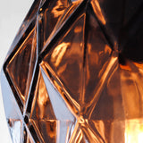 copper coloured cut glass pendant light detailing