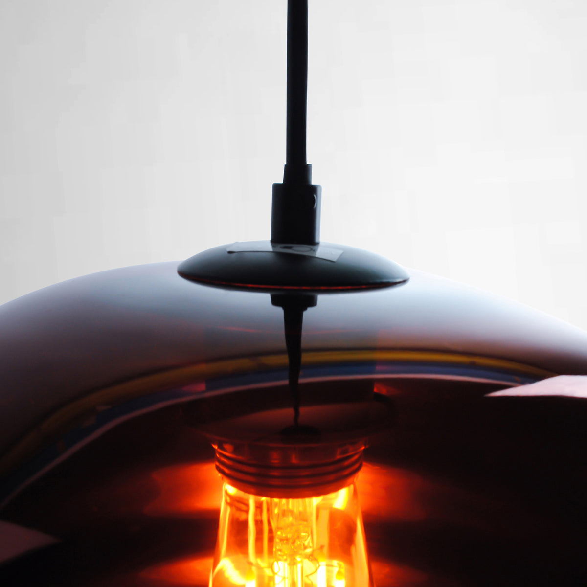 copper glass pendant light with black lamp holder