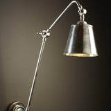 Choose your own finish to match your space on our Douglas wall lamps made from solid brass.