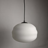 Matte white opal glass jupiter pendant lamp from SMITH&SMITH Lighting in Sydney pictured with black cord and black ceiling cup