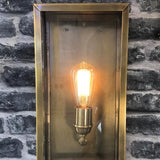 SMITH & SMITH Camden Lantern Outdoor Wall Lamp in Antique Brass lighting up a beautiful bluestone brick Australian home insta