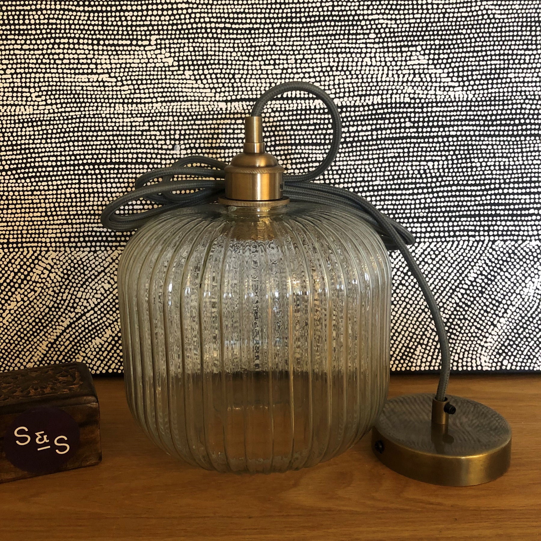 Cohen Small Hand-blown Lantern Pendant in Clear Glass with grey cord and brass lamp holder