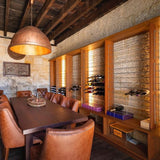 SMITH & SMITH Walton Large Antique Brass Iron Riveted Dome Pendant Lamp above table in Australian Wine Cellar Tasting Room insta
