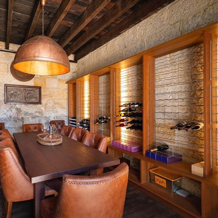 SMITH & SMITH Walton Large Antique Brass Iron Riveted Dome Pendant Lamp above table in Australian Wine Cellar Tasting Room insta