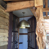 SMITH & SMITH Walton Large Antique Brass Iron Riveted Dome Pendant Lamp hanging hanging out front of an Australian log cabin insta