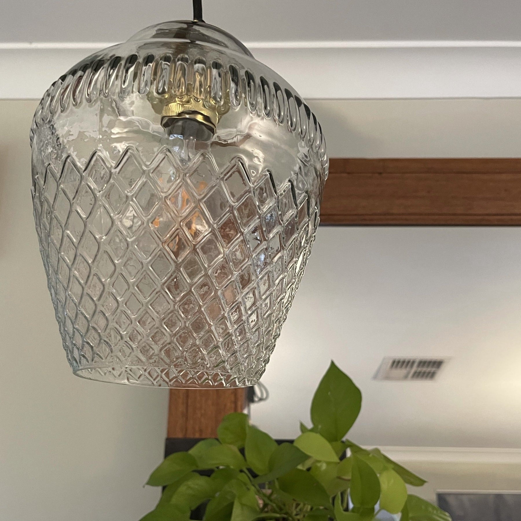 SMITH&SMITH Clear Glass Zarz Pendant Lamp in Sydney Sitting Room Fire place. insta